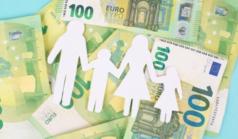 Basic child benefit, family and money, Euro banknotes, new regulation against poverty in Germany, social issue